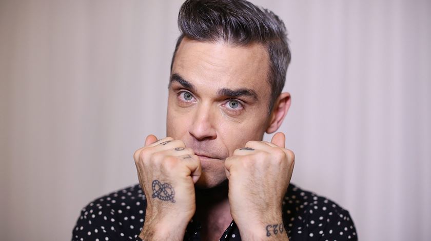 Robbie Williams, cantor britânico. Foto: David Moir/ EPA
