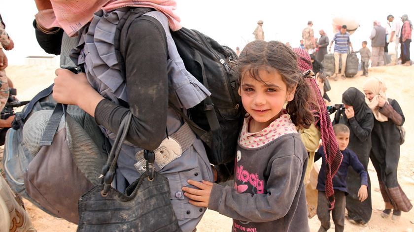 Refugiados na fronteira entre a Jordânia e a Síria. Foto: Jamal Nasrallhah/EPA
